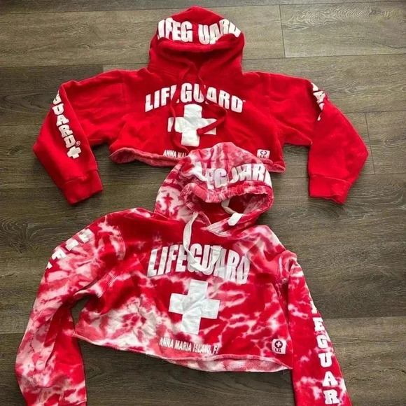 official Lifeguard Tops - Set of 2 Lifeguard cropped sweatshirts. Anna Maria Island. Size small and XL.